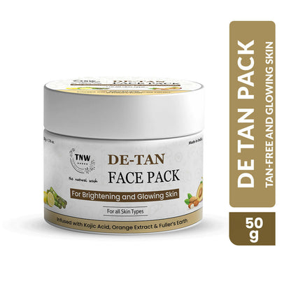The Natural Wash De-Tan Face Pack for glowing skin, shown in a jar with a creamy, herbal face mask texture, ideal for skin care.