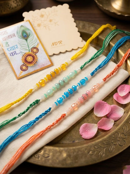 Anouk Set Of 4 Multicolor Artificial Beads Thread Rakhi With Roli Chawal Chandan Mishri