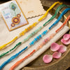 Dhiyona Set Of 4 Multicolor Artificial Beads Thread Rakhi With Roli Chawal Chandan Mishri