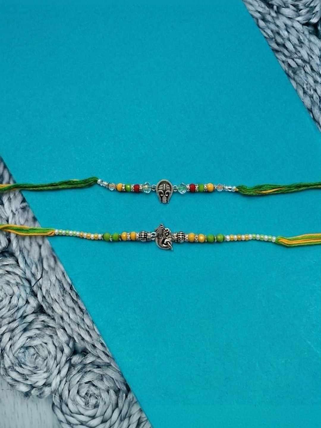 Anouk Set Of 2 Multicolor Religious Thread Rakhi With Roli Chawal Chandan Mishri