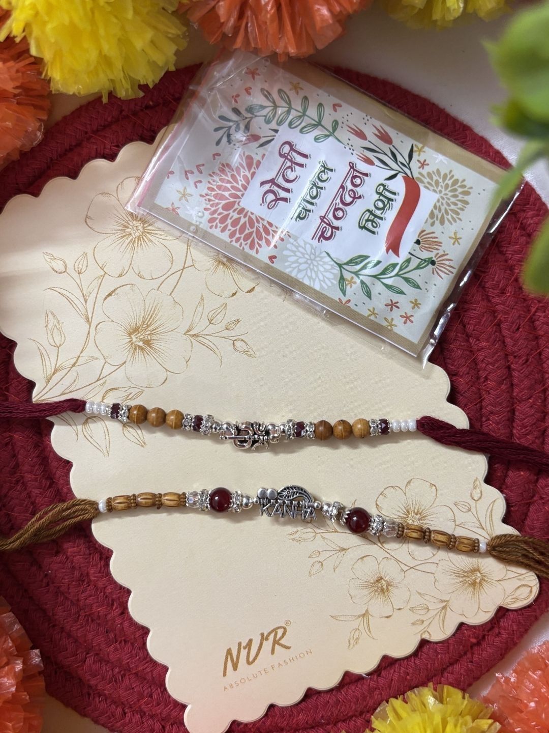 Anouk Set Of 2 Silver Toned Religious Rakhi Thread Rakhi Roli Chawal Chandan Mishri