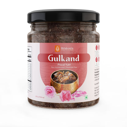 Jar of Krishna's Herbal & Ayurveda Gulkand, a sweet rose petal preserve, in a glass container with a spoon.