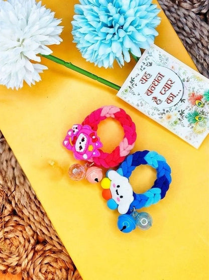 Anouk Set Of 2 Blue & Pink Kids Rakhi With Roli Chawal Chandan Mishri
