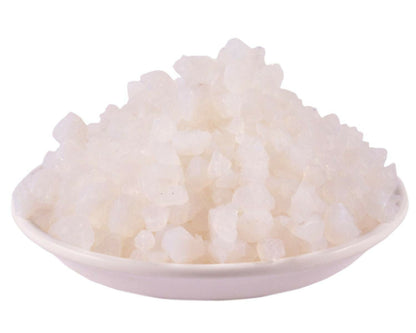 Yuvika Banslochan Ayurvedic Vanslochan Tabashir silicic acid in a clear container with natural background.