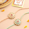 Dhiyona Men Set Of 2 Peach & Green Kundan Studded Round Floral Design Rakhi With Roli Chawal