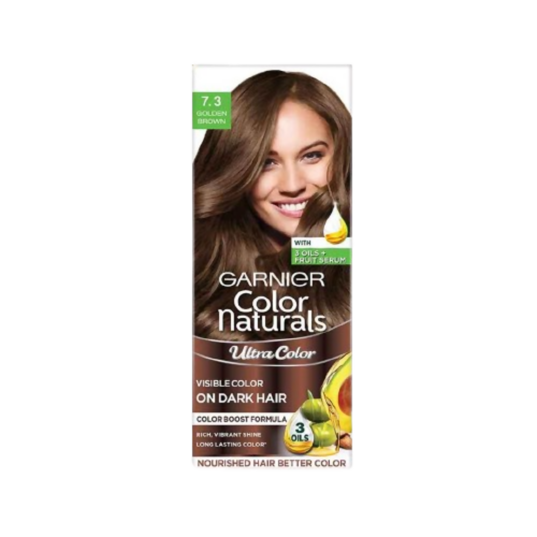 Garnier Color Naturals Ultra Hair Color in 7.3 Golden Brown showing a tube of hair dye and a mixing bowl with color cream.