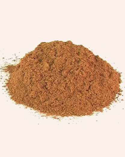 Simandhar Babool Powder Ayurvedic Churna in a clear glass jar with a scoop, highlighting natural herbal health supplement.
