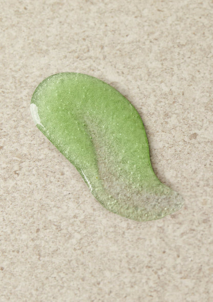 The Body Shop Tea Tree Skin Clearing Daily Scrub showing a tube of exfoliating scrub with tea tree extract for clear skin.