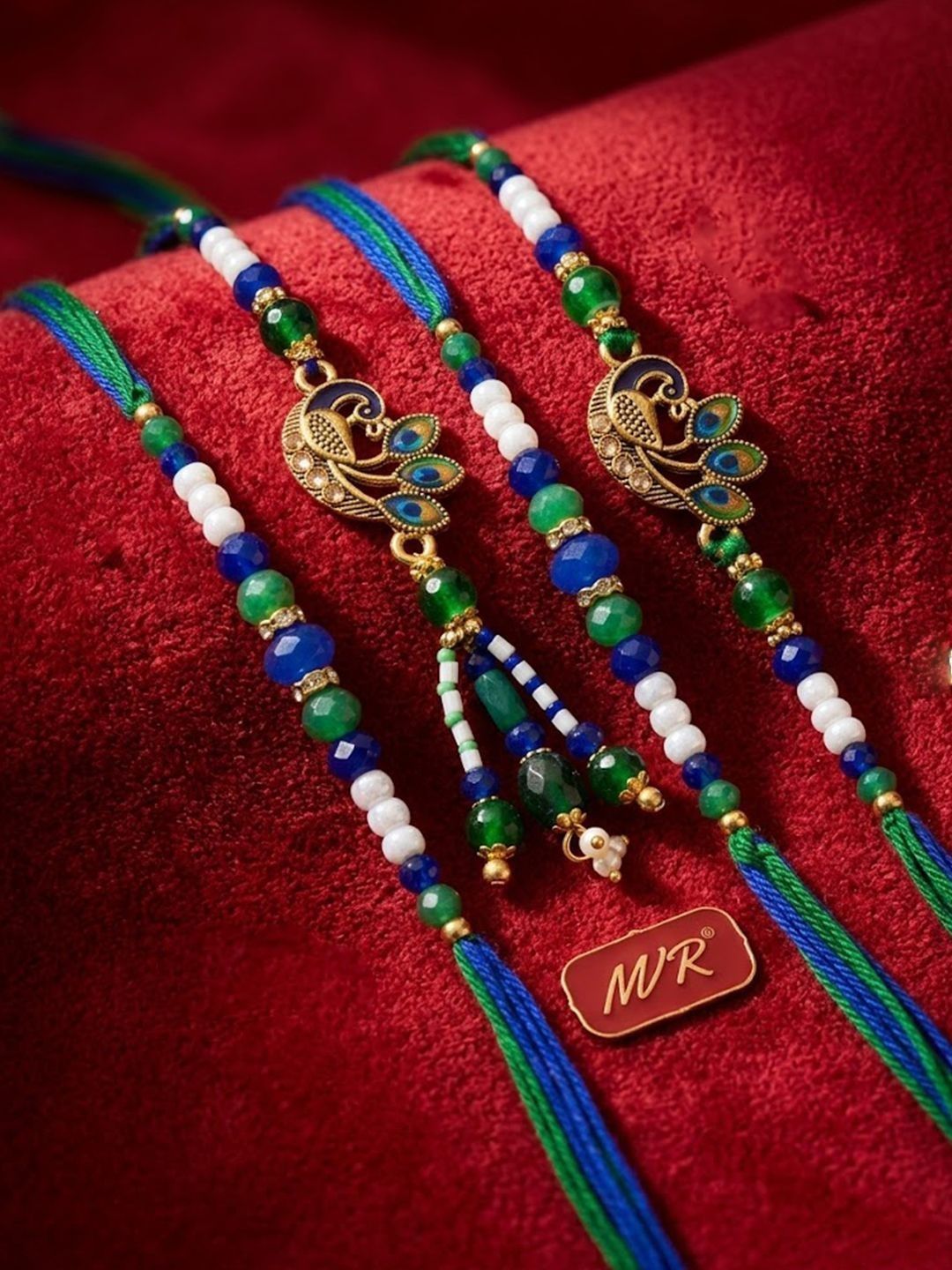 Anouk Set Of 4 Green Peacock Design Artificial Beads Thread Rakhi With Roli Chawal