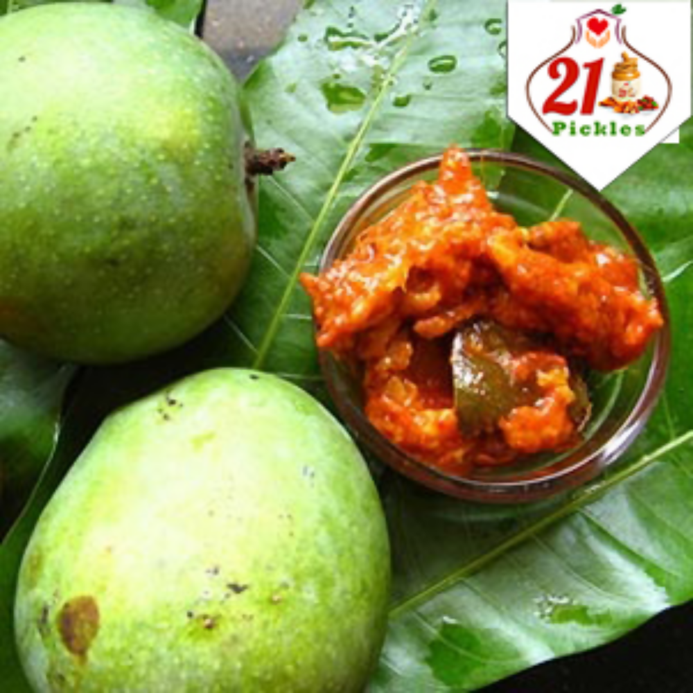 Spicy North Indian mango pickle by 21Pickles in a glass jar, showing vibrant orange mango pieces and traditional Indian spices.
