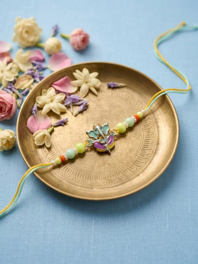 Dhiyona Multicolor Artificial Beads Ganesh Ji Thread Rakhi With Roli Chawal Chandan Mishri