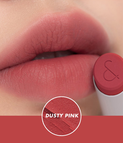 Rom&nd Zero Matte Lipstick in Dusty Pink, showcasing a soft pink lipstick with matte finish in a sleek tube.