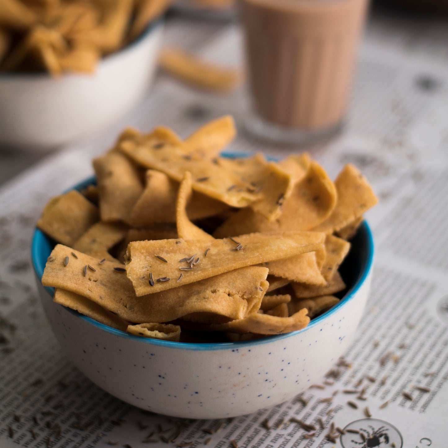 Golden Ribbon Pakodi snack from Almond House, crispy and crunchy Indian-style snacks in a bowl.
