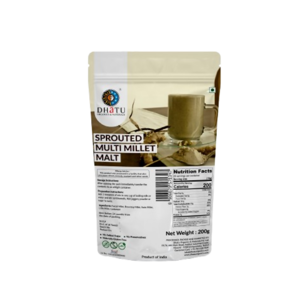 Dhatu Organics & Naturals Sprouted Multi Millet Malt in a glass, showing the health drink's frothy, golden appearance with millet grains visible.