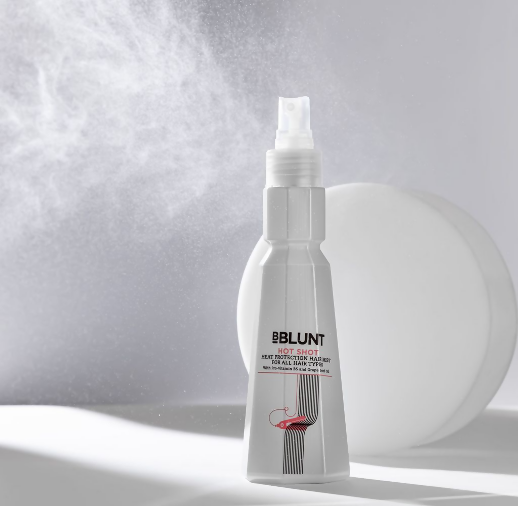 BBlunt Hot Shot Heat Protection Mist spray bottle with grapeseed oil and provitamin B5 for hair protection and shine.