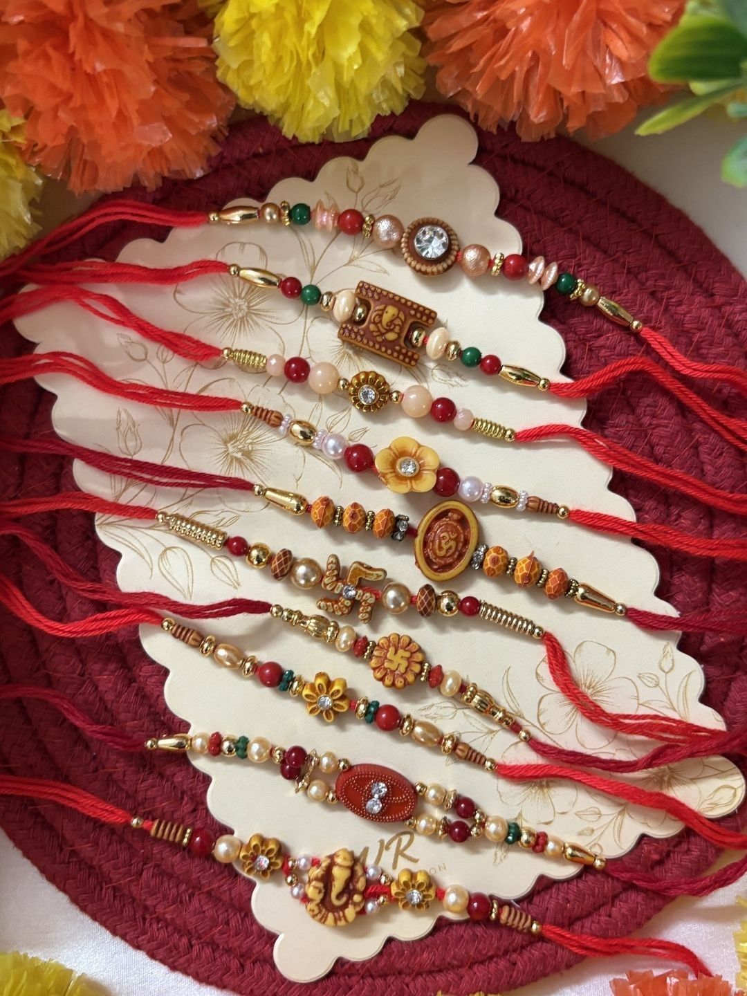 Anouk Set Of 10 Multicolor Designer Thread Rakhi With Roli Chawal Chandan Mishri