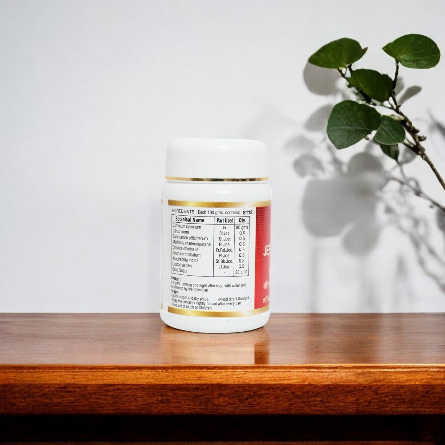 Impcops Jeeraka Churnam Ayurvedic powder in a glass bowl, highlighting its fine greenish spice blend for digestion and health.