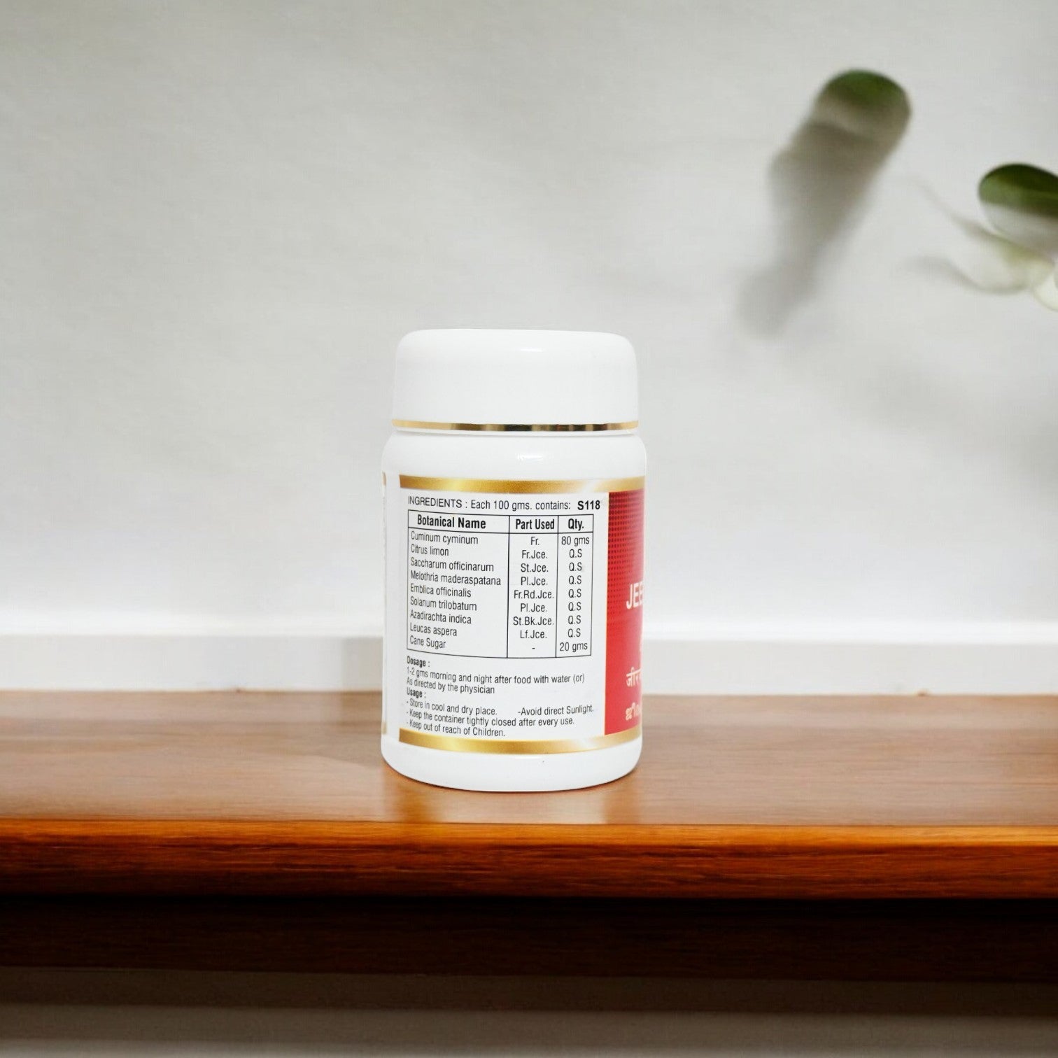 Impcops Jeeraka Churnam Ayurvedic herbal powder in a bowl, showcasing ground cumin seeds used in traditional Indian medicine.