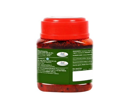 Tasty Nibbles Puli Inji tamarind ginger chutney jar with label, showcasing the flavorful condiment for Indian cuisine.