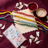 Dhiyona Set Of 4 Multicolor Artificial Beads Thread Rakhi With Roli Chawal Chandan Mishri