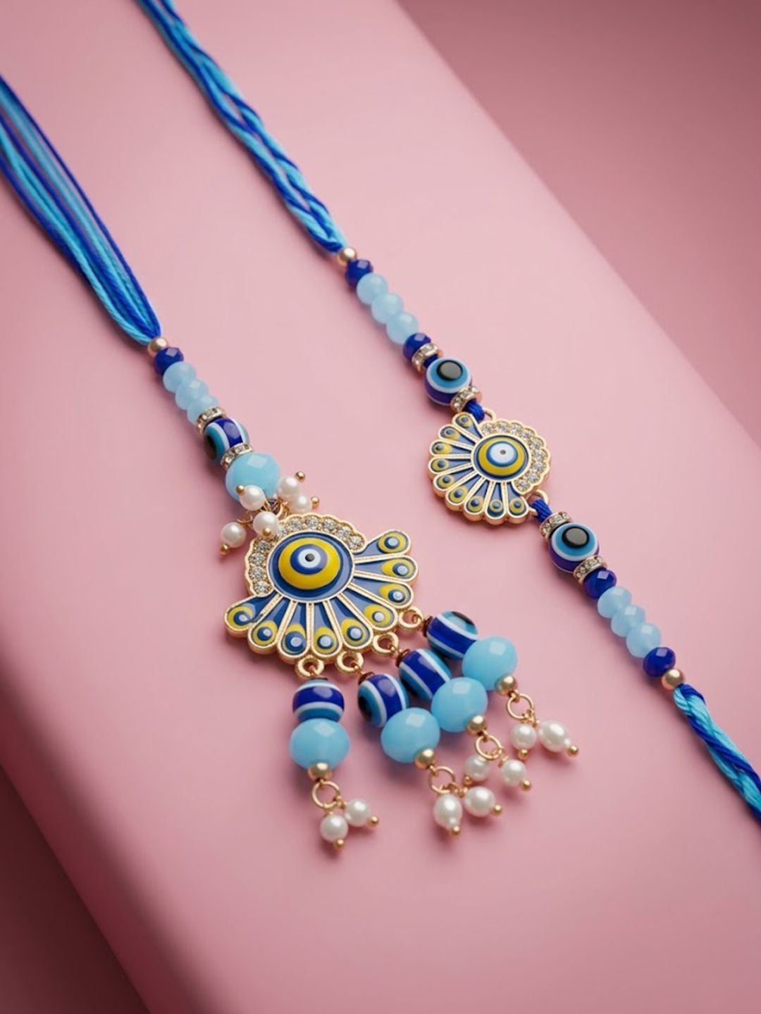 Anouk Set Of 2 Blue Evil Eye Artificial Beads Bhaiya Bhabhi Rakhi With Roli Chawal
