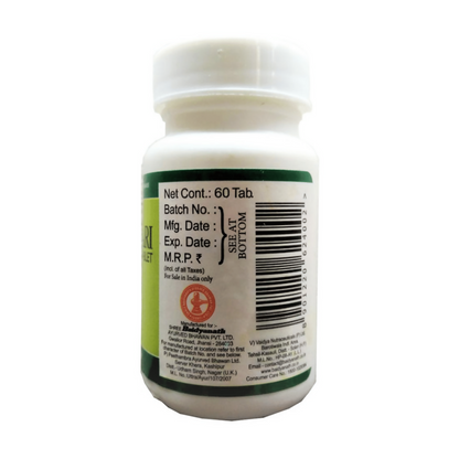 Baidyanath Jhansi Swapn Doshhari Ayurvedic Tablets bottle with tablets inside, traditional herbal supplement for sleep support.