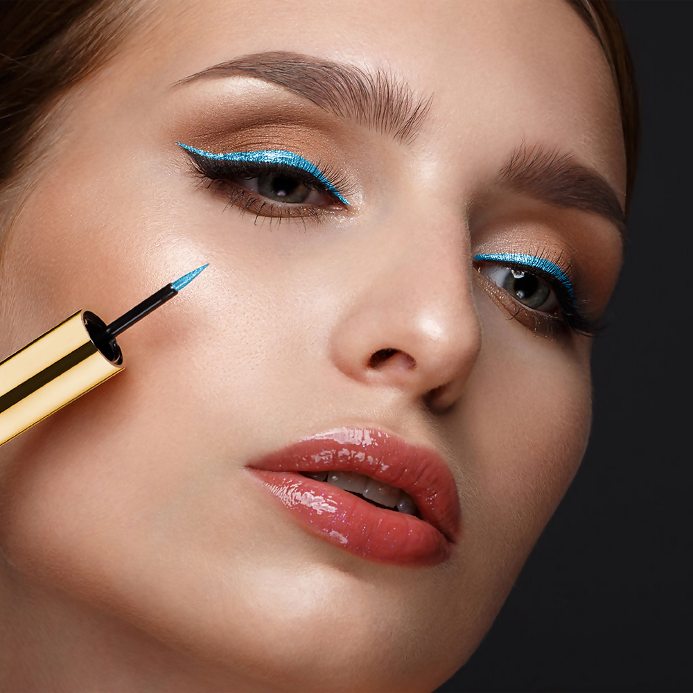 Lakme Glitterati Collection Shine Eyeliner in Daring Blue, a vibrant liquid eyeliner with a shimmering finish for bold eye looks.