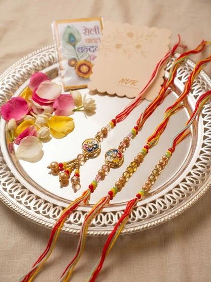 Anouk Set Of 4 Artificial Beads Family Pack Thread Rakhi With Roli Chawal Chandan Mishri