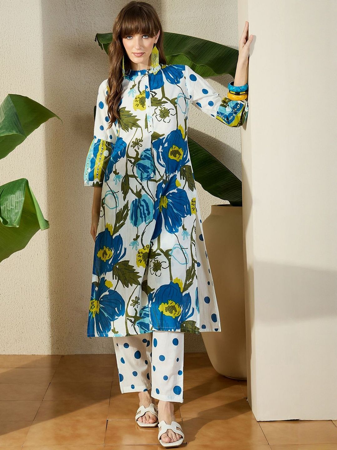 Women Floral Printed Cotton Kurta with Trousers