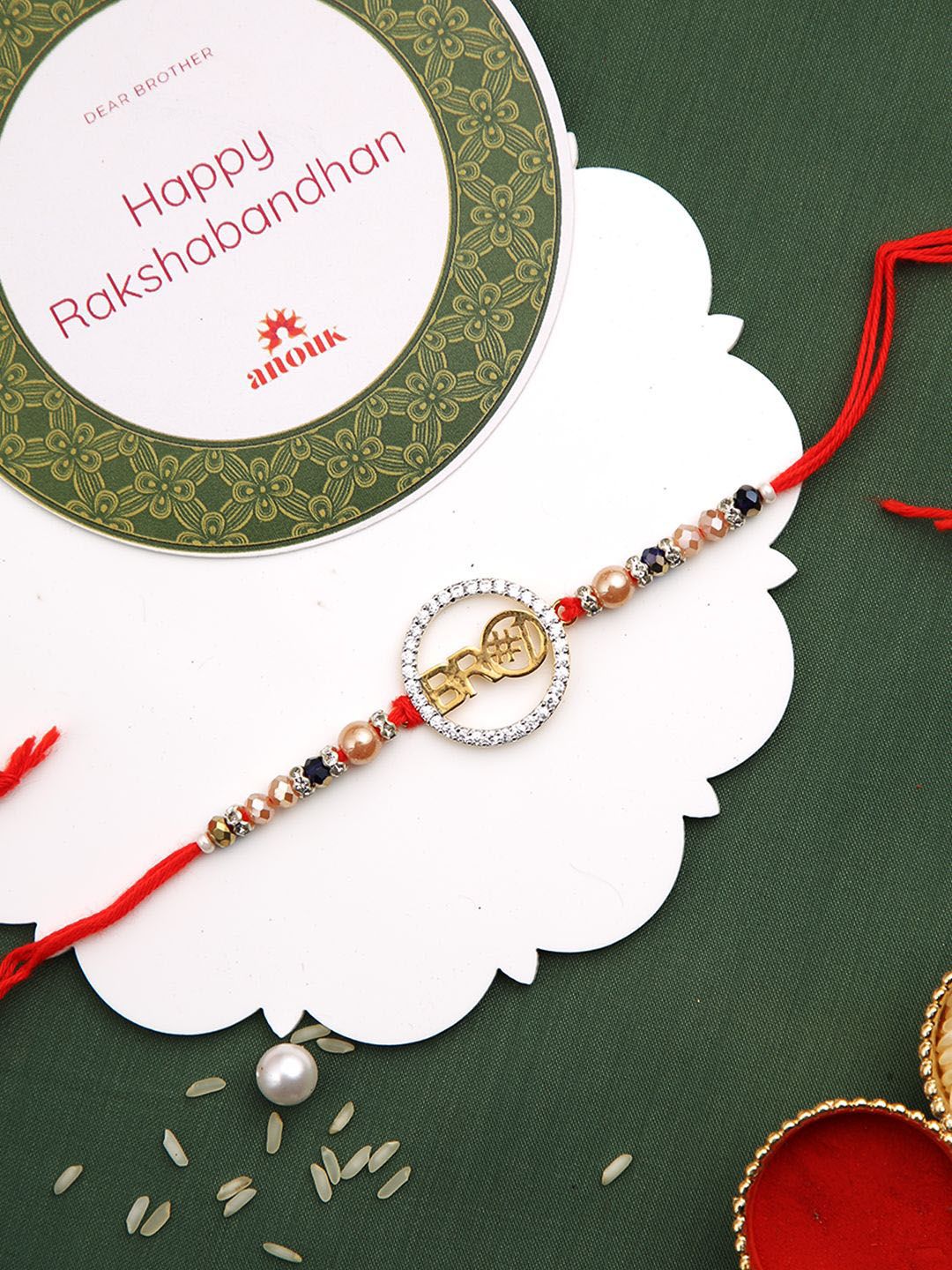 Anouk Red Stone Studded & Beaded Thread Rakhi With Roli Chawal & Greeting Card