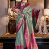 Women's Tissue Pink Woven Design Designer Saree With Blouse Piece
