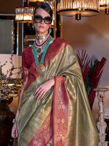 Women's Tissue Maroon Woven Design Designer Saree With Blouse Piece