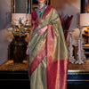 Women's Tissue Maroon Woven Design Designer Saree With Blouse Piece