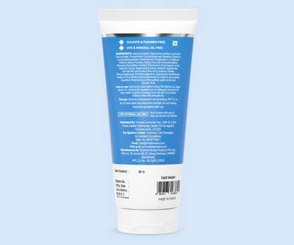 The Derma Co Tran-Zelaic Pigmentation Corrector Face Wash bottle with white and pink packaging on a clean surface.