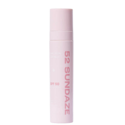 52 Sundaze Rosewater Sunscreen Mist SPF 50+ PA++++ spray with clear glow, featuring a sleek bottle and mist nozzle for sun protection.