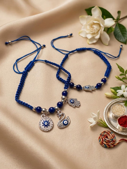 Anouk Set Of 2 Blue & Silver Evil Eye Design Bhaiya Bhabhi Rakhi With Roli Chawal Chandan
