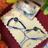 Dhiyona Set Of 2 Blue Evil Eye Thread Rakhi With Roli Chawal Chandan Mishri