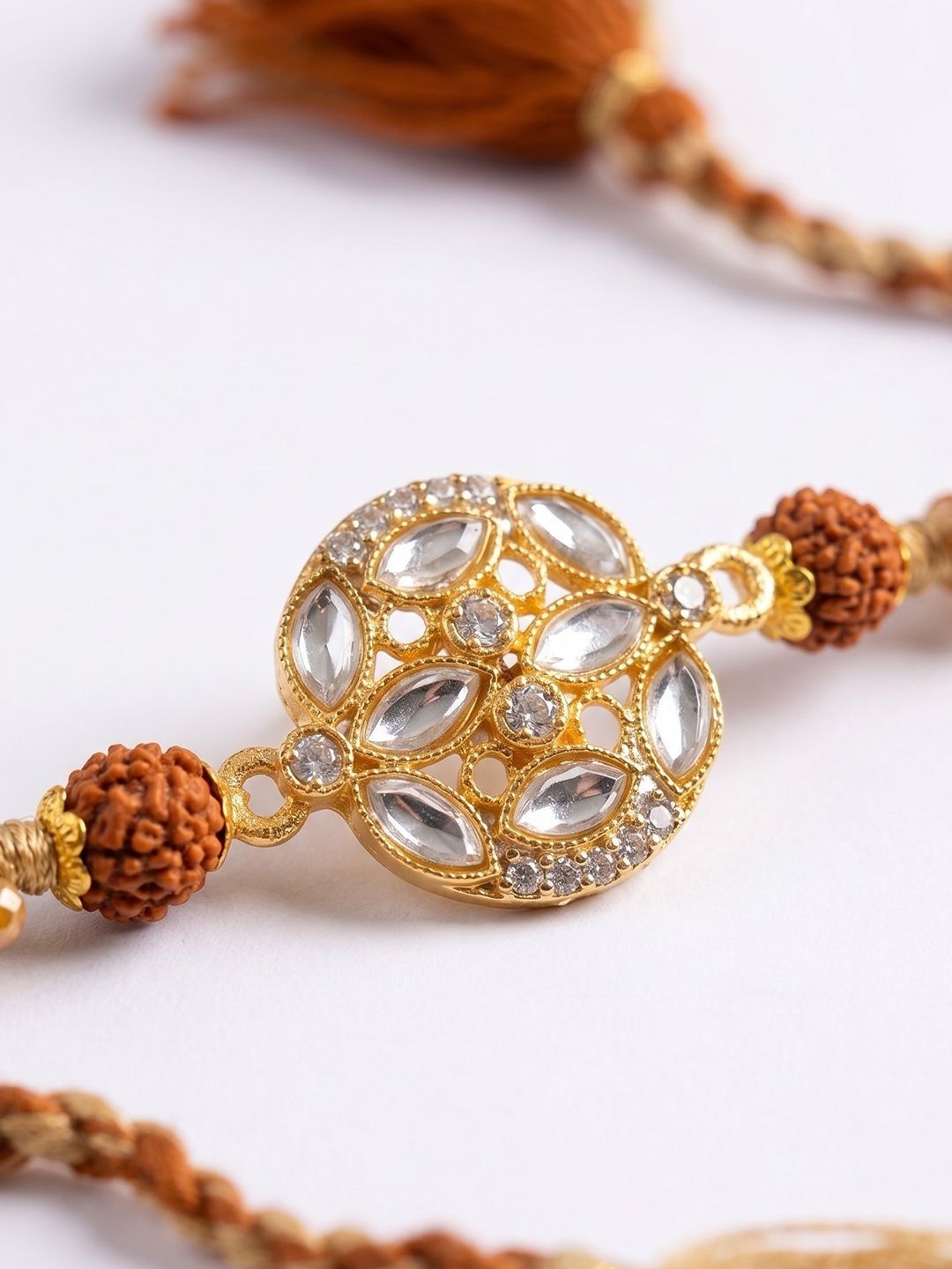 Anouk Rudraksh & Kundan Studded Gold Toned Thread Rakhi With Roli Chawal Chandan Mishri