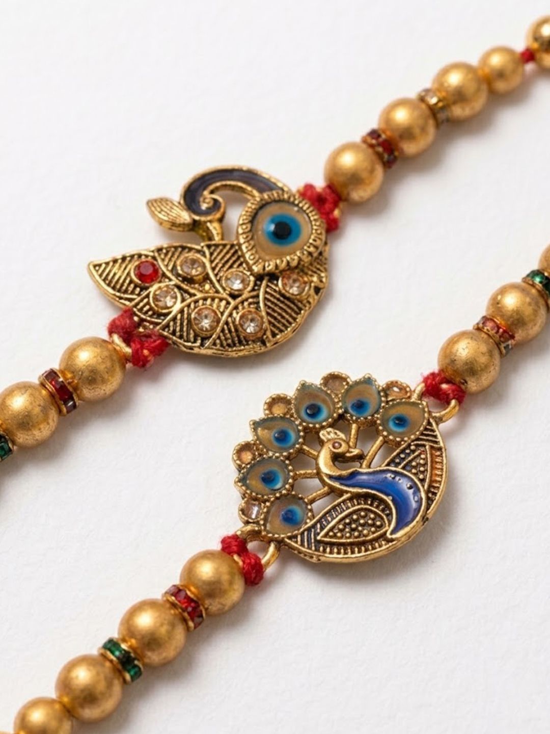 Anouk Set Of 2 Peacock & Ghungroo Design Multicolor Thread Rakhi With Roli Chawal Chandan