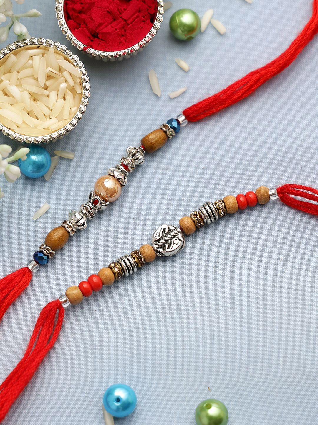 Anouk Set Of 2 Silver-Toned Beaded Rakhi With Roli Rice & Greeting Card
