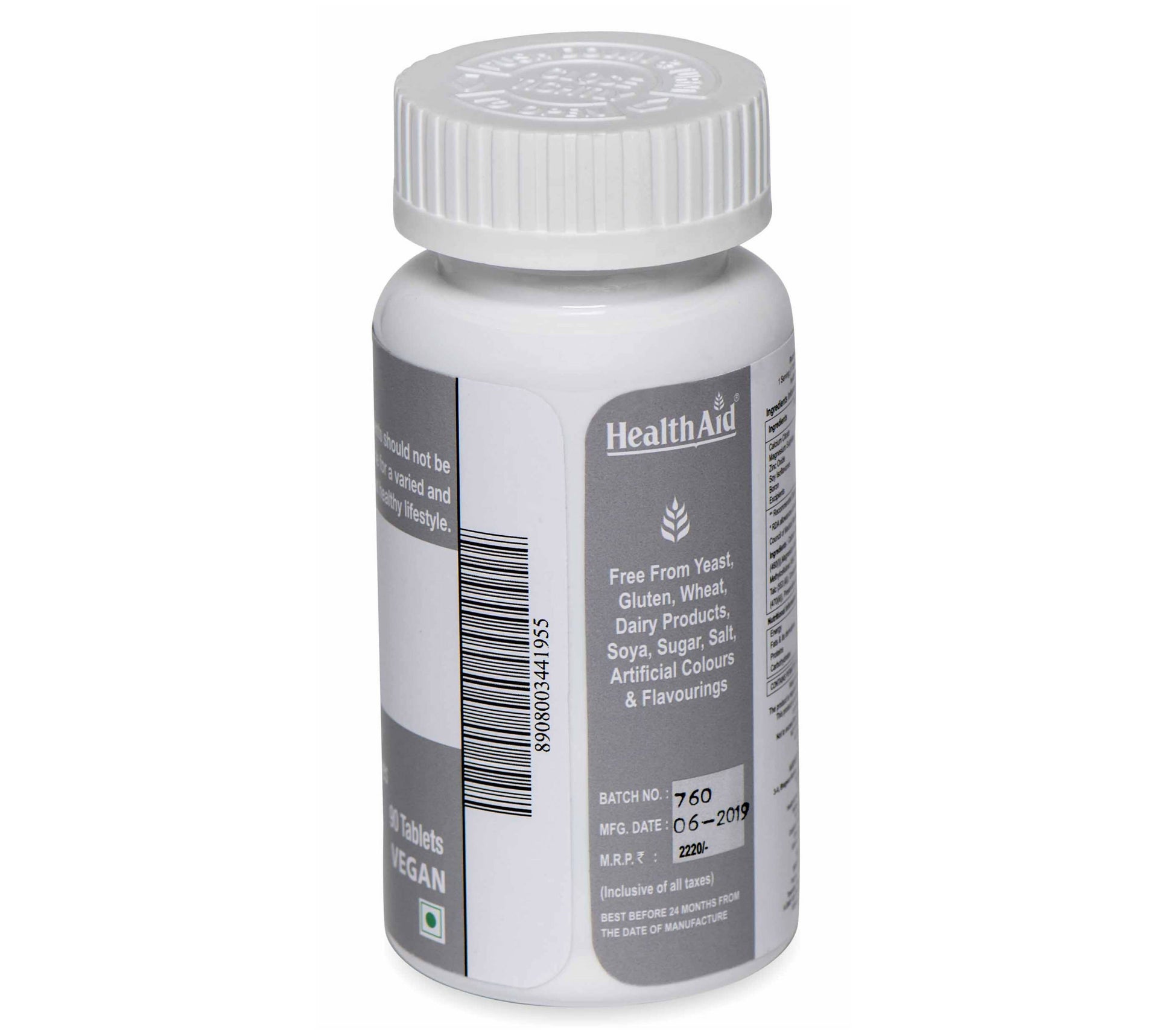 HealthAid Calmagzinc Ayurvedic tablets in a blister pack, showing white tablets for bone and immune health support.