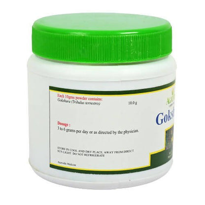Agatsya Gokshura Churna in a glass bowl, showing fine herbal powder from the Agatsya brand on a white background.