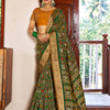 Women's Soft Silk Green Woven Design Designer Saree With Blouse Piece