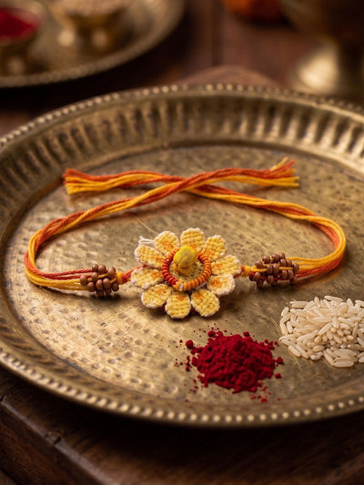 Indyancart Yellow Floral Seed Thread Rakhi With Roli Chawal Chandan Mishri