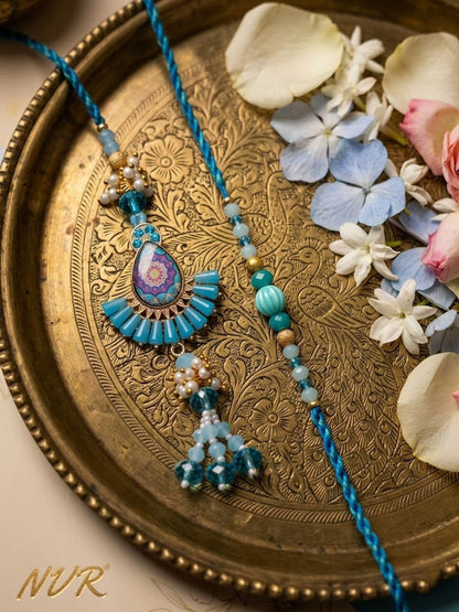 Anouk Set Of 2 Transparent Beads Pear Shape Bhaiya Bhabhi Rakhi With Roli Chawal Chandan