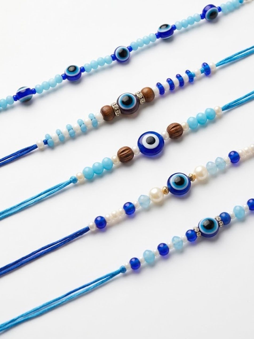 Anouk Set Of 5 Blue Evil Eye Thread Rakhi With Roli Chawal Chandan Mishri