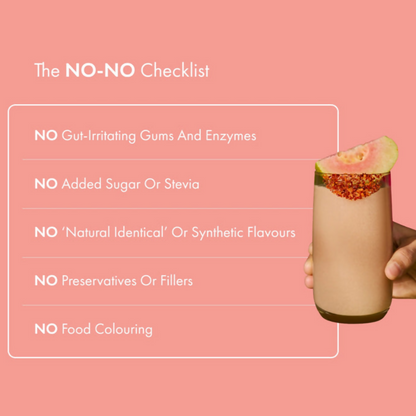 Cosmix No Nonsense Plant Protein Chilli Guava health drink in a clear glass with vibrant red chili and guava slices.