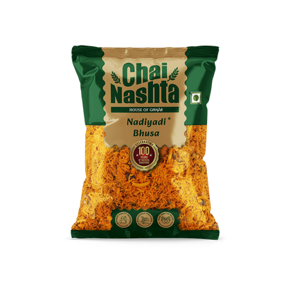 Girnar Chai Nashta Nadiyadi Bhusa, North Indian snack with crispy, flaky wheat and spice mixture, served as a traditional snack.