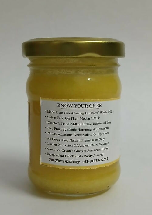 Satjeevan Organic Vedic Gir Cow Bilona Ghee jar showing golden, clarified cow ghee in a glass container with traditional packaging