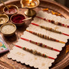 Dhiyona Set Of 5 Multicolor Designer Thread Rakhi With Roli Chawal Chandan Mishri